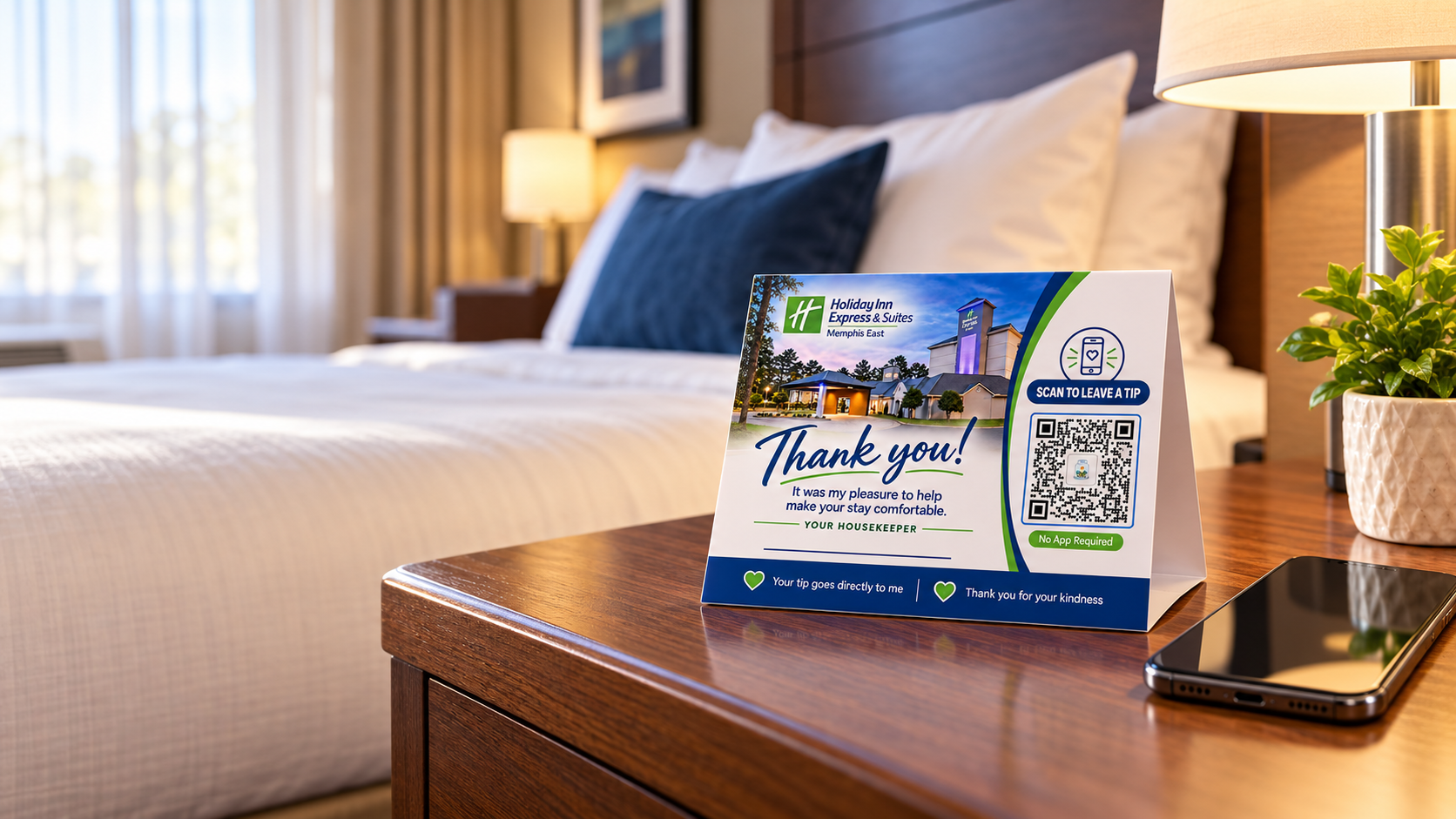 Hotel-branded housekeeping tipping card on a nightstand beside a neatly prepared bed, with a Scan to Leave a Tip QR code and a guest's phone nearby